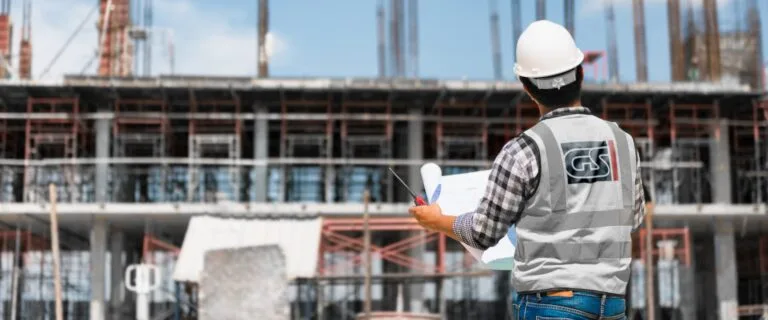 Global Surveys inspector working on a construction site