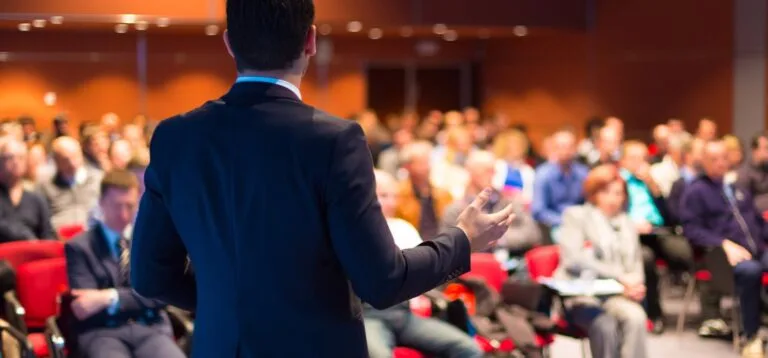 Speaker at Business Conference and Presentation. Audience at the conference hall.